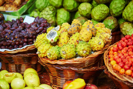 Fresh and ripe exotic fruits on traditional farmer market Mercado dos Lavradores, Funchal, Madeira island, Portugalの写真素材