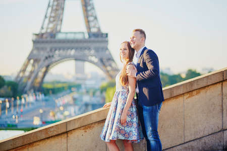 Romantic couple near the Eiffel tower in Paris, Franceの写真素材