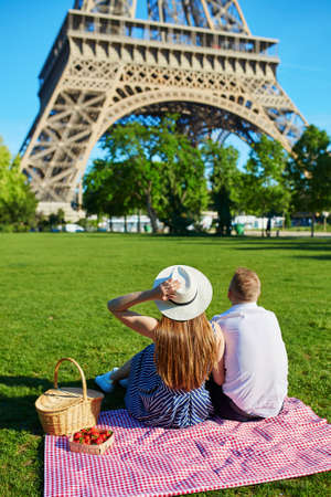 Romantic couple having picnic together in Paris, Franceの写真素材