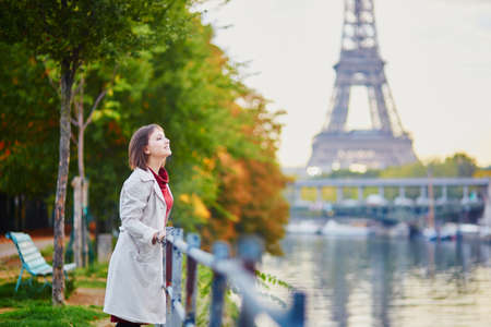Beautiful young woman in Paris on a bright fall day