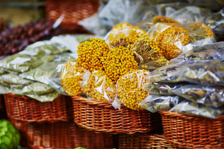 Dry herbs and flowers on traditional farmer market Mercado dos Lavradores, Funchal, Madeira island,...