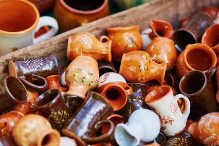 Handmade ceramic jugs sold on Easter fair in Vilnius, Lithuania. Traditional Lithuanian spring fairの写真素材