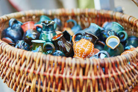 Handmade ceramic jugs sold on Easter fair in Vilnius, Lithuania. Traditional Lithuanian spring fairの写真素材