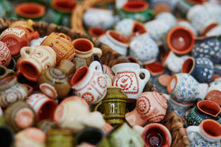 Handmade ceramic jugs sold on Easter fair in Vilnius, Lithuania. Traditional Lithuanian spring fairの写真素材