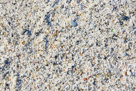 Closeup of many white grains on Is Arutas beach known as Rice beach in Sardinia, Italyの写真素材