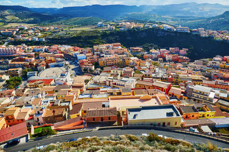 Scenic view to Castelsardo village with its colorful houses in Sardinia, Italyの写真素材