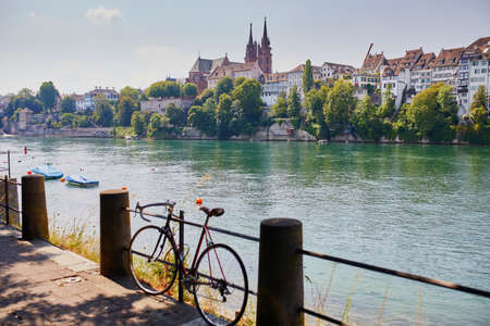Scenic view of Rhine embankment with people swimming in the river in Basel, Switzerlandの写真素材