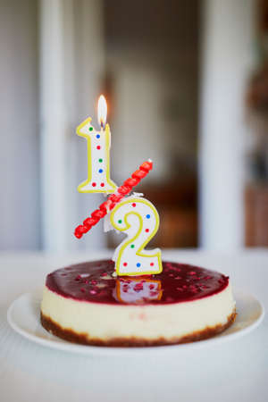 Birthday cake with candle on it. Creative way to celebrate six month of a baby. Anniversary candle...