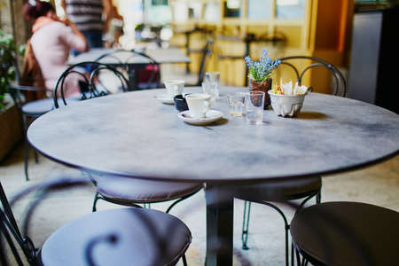 Empty coffee cup on table in cafe or restaurant in Lugano, Ticino, Switzerland
