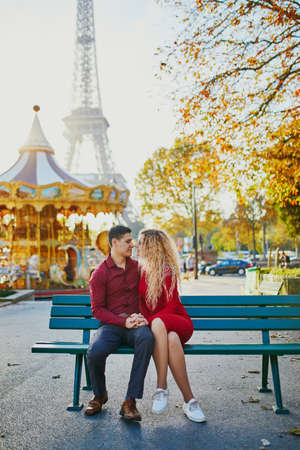 Romantic couple in love near the Eiffel tower in Paris, Franceの写真素材