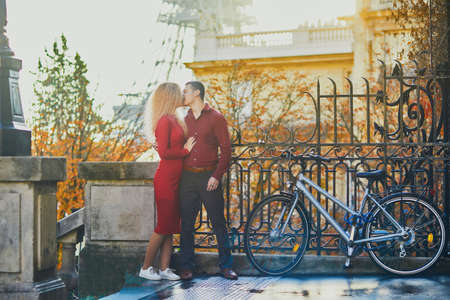 Romantic couple in love near the Eiffel tower in Paris, Franceの写真素材