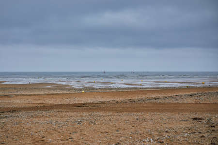 Sand beach at low tide in Lower Normandy, Franceの写真素材
