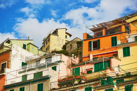 Colorful houses in Riomaggiore, one of five famous villages of Cinque Terre in Liguria, Italyの写真素材