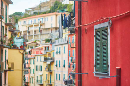 Colorful houses in Riomaggiore, one of five famous villages of Cinque Terre in Liguria, Italyの写真素材