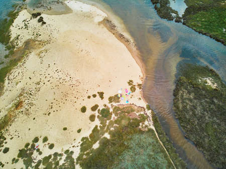 Scenic aerial view of the Atlantic ocean coast and estuary of Ruisseau de cires in Saint-Brice,...