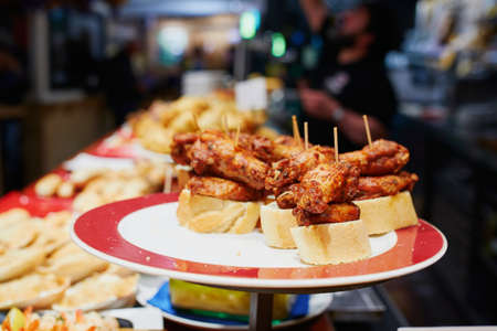 Variety of pinchos (pintxos) in a bar of San Sebastian (Donostia), Spainの写真素材