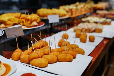 Variety of pinchos (pintxos) in a bar of San Sebastian (Donostia), Spain