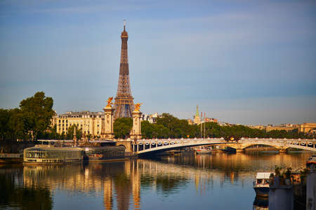 Scenic panormaic view of the Eiffel tower and Alexandre III bridge over the river Seine in Paris, Franceの写真素材