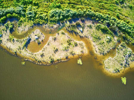 Scenic aerial view of the Atlantic ocean coast and estuary of Ruisseau de cires in Saint-Brice, Gironde, Franceの写真素材
