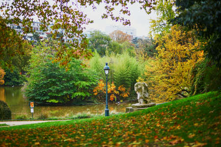 Scenic view of beautiful Montsouris park in Paris, France on a bright fall day in Novemberの写真素材