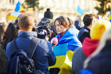 Paris, France - February 27, 2022: Massive manifestation against war in Ukraine on Place Saint-Michel in Paris, Franceのeditorial素材