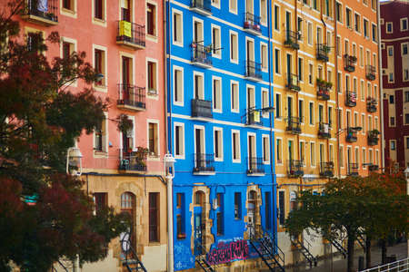 BILBAO, SPAIN - NOVEMBER 3, 2021: Colorful buildings on a street of Bilbao, Basque Country, Spainのeditorial素材