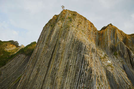 Famous flysch of Zumaia, Basque Country, Spain. Flysch is a sequence of sedimentary rock layers that...