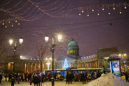 SAINT PETERSBURG, RUSSIA - JANUARY 09, 2022: Christmas decorations near Kazan Cathedral also known as Cathedral of Our Lady of Kazan on a cold snowy day in Saint-Petersburg, Russiaのeditorial素材