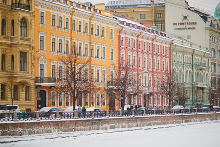 SAINT PETERSBURG, RUSSIA - JANUARY 09, 2022: Moyka river embankment on a cold snowy winter day in...