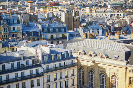 Scenic Parisian cityscape. Aerial view of buildings and roofs in historical center of Paris, Franceの写真素材