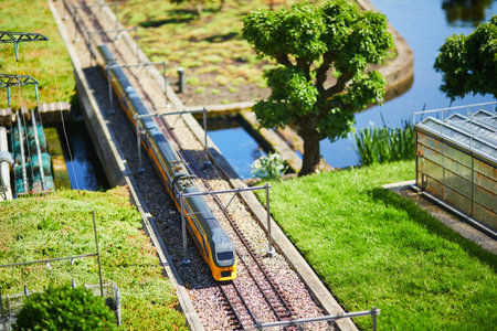 THE HAGUE, THE NETHERLANDS - APRIL 26, 2022: Mini models of trains at Madurodam miniature park, The Hague, the Netherlands, Hollandのeditorial素材