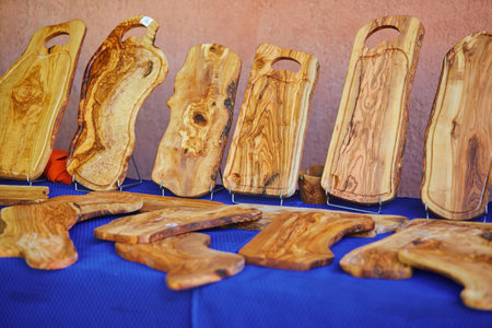 Olive cutting boards on a street market in Cucuron, Provence, Southern Franceの写真素材