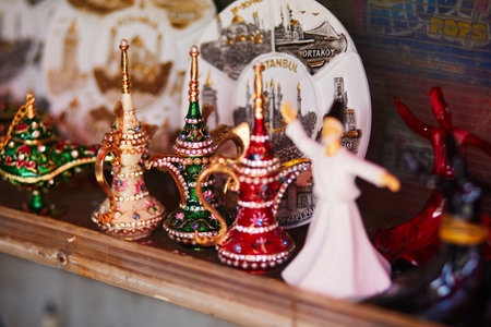 ISTANBUL, TURKEY - APRIL 25, 2023: Various figurines of dervishes for sale on a street market in Istnabul, Turkeyのeditorial素材