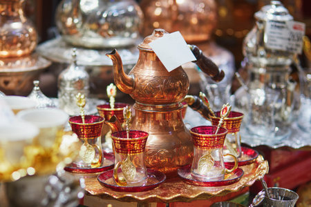 Beautiful tea set on Egyptian Bazaar or Spice Bazaar, one of the largest bazaars in Istanbul, Turkey. Market sells spices, sweets, jewellery, dried fruits and nutsの写真素材