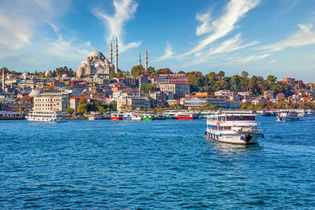 ISTANBUL, TURKEY -  October 9th, 2019: View to Eminonu pier and Suleymaniye mosque across Bay of Golden Horn on sunny morningのeditorial素材