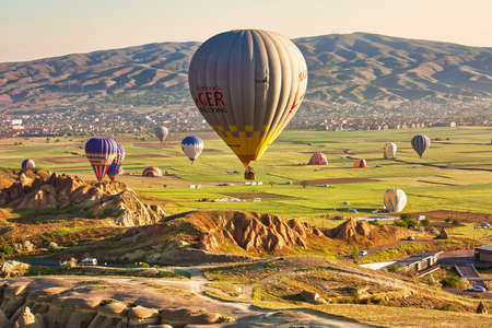 Goreme, Turkey - May 24th, 2017: Baloon flight, famous tourist attraction in Cappadocia regionのeditorial素材