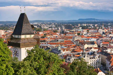 GRAZ, AUSTRIA - July 12th, 2019: Aerial view to the city of Graz with Clock tower, the symbol og the city, and the Town hall belowのeditorial素材