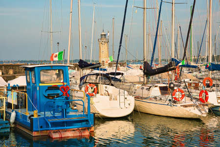 Boats in the harbour on Lake Gardaのeditorial素材