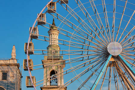 Giant ferris wheel in Kontraktova square in Kyiv, Ukraineの写真素材