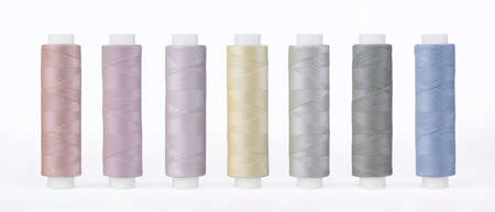 Set of sewing thread coils, miscellaneous colours, isolated on white