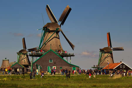 ZAANSE SCHANS, THE NETHERLANDS - May 1st, 2016: Windmills in Zaanse Schans open-air museum, many...