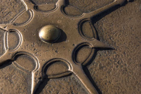 Close up of bronze compass rose in a mountain locator at Dee Wright Observatory.の写真素材