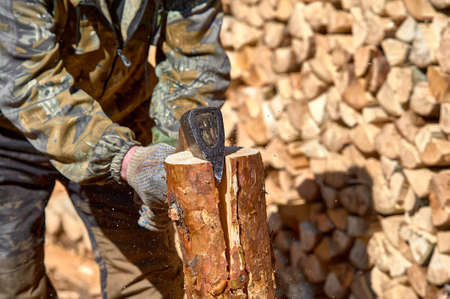 chopping wood with a chopper close-up