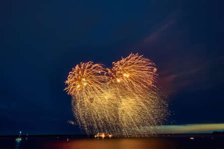 Colorful fireworks on the black sky backgroundの写真素材