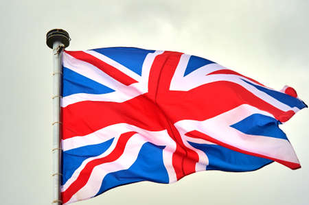 the flag of Great Britain is flying on the flagpoleの写真素材