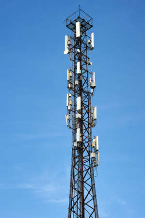 cell phone tower on a blue sky background
