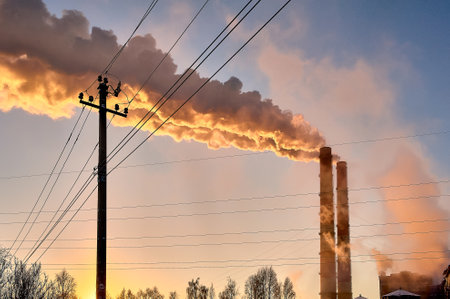white smoke is coming out of the pipes in the blue sky
