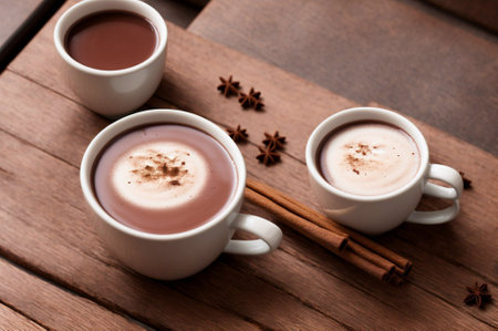 Two cups of hot chocolate on a wooden background, selective focus.の素材