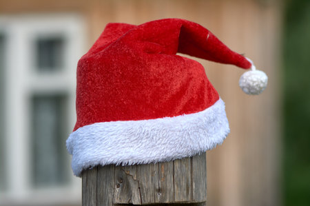 santa Claus hat is put on a poleの写真素材