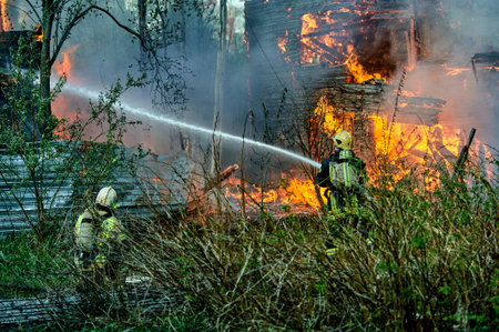 extinguishing the fire of a wooden house
